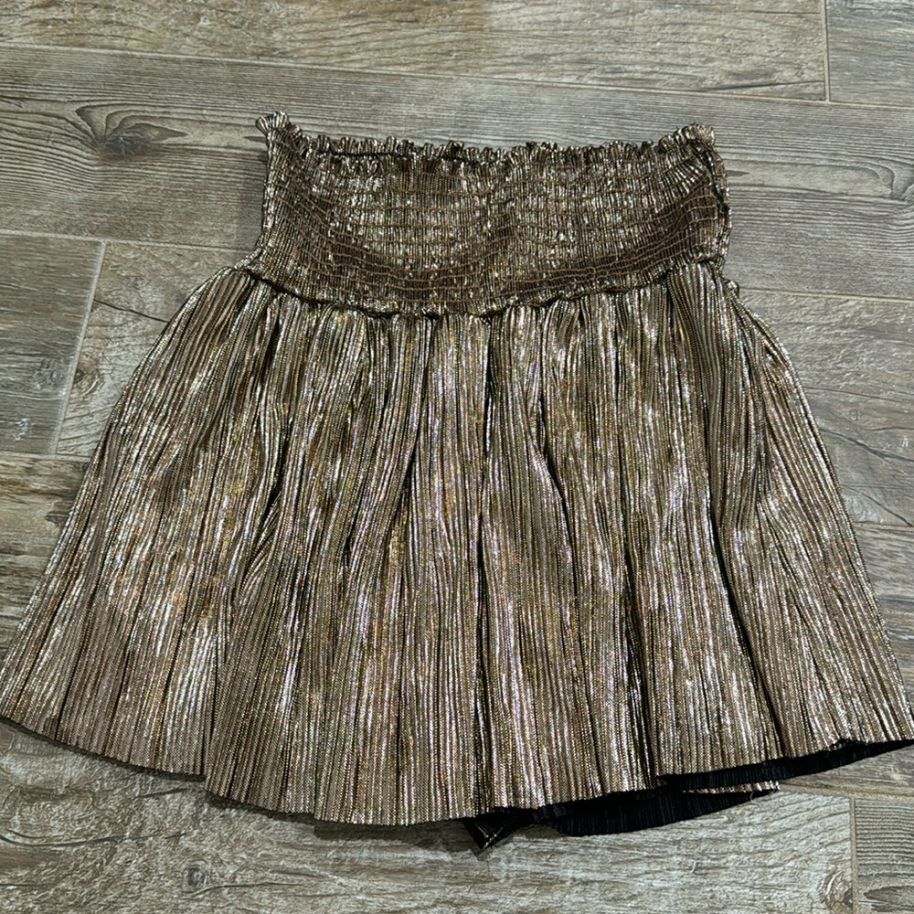 Gold shimmery skirt. Size small. Brand is Karlie